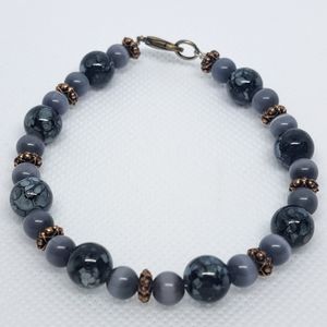 6 3/4" Grey Catseye with Black Glass Crackle Beads.